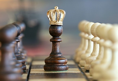gold crown on chess piece