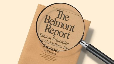 Belmont Report with title magnified through a magnifying glass