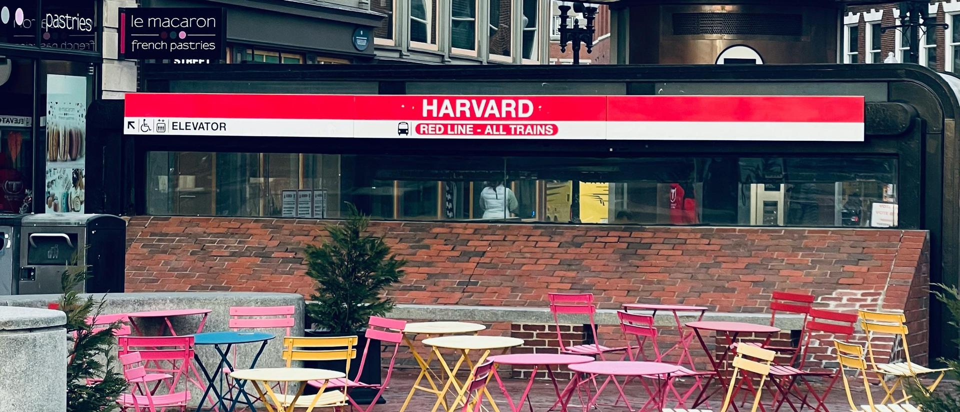 Harvard Square MBTA stop with colorful tables and chairs out front